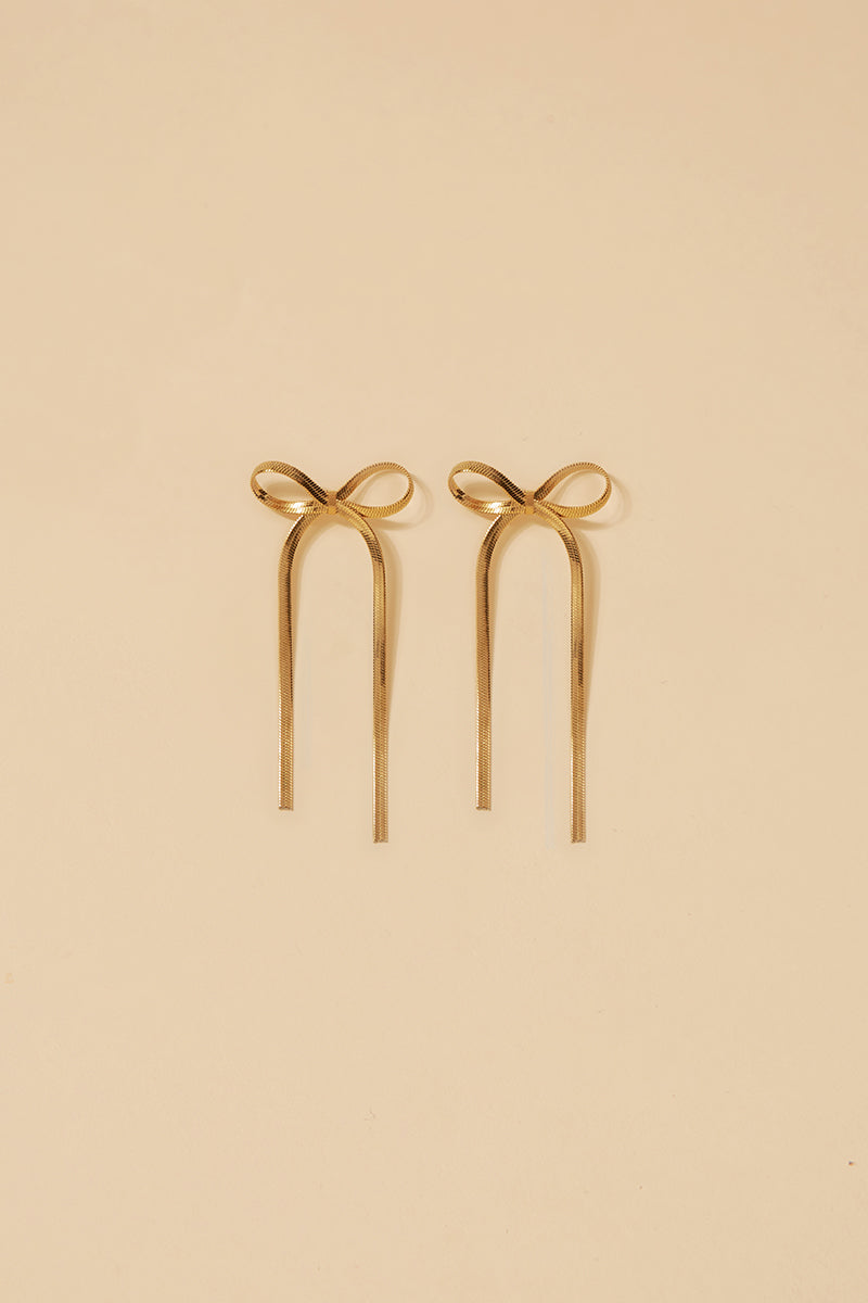 Long Bow Gold Earrings · Allure ·