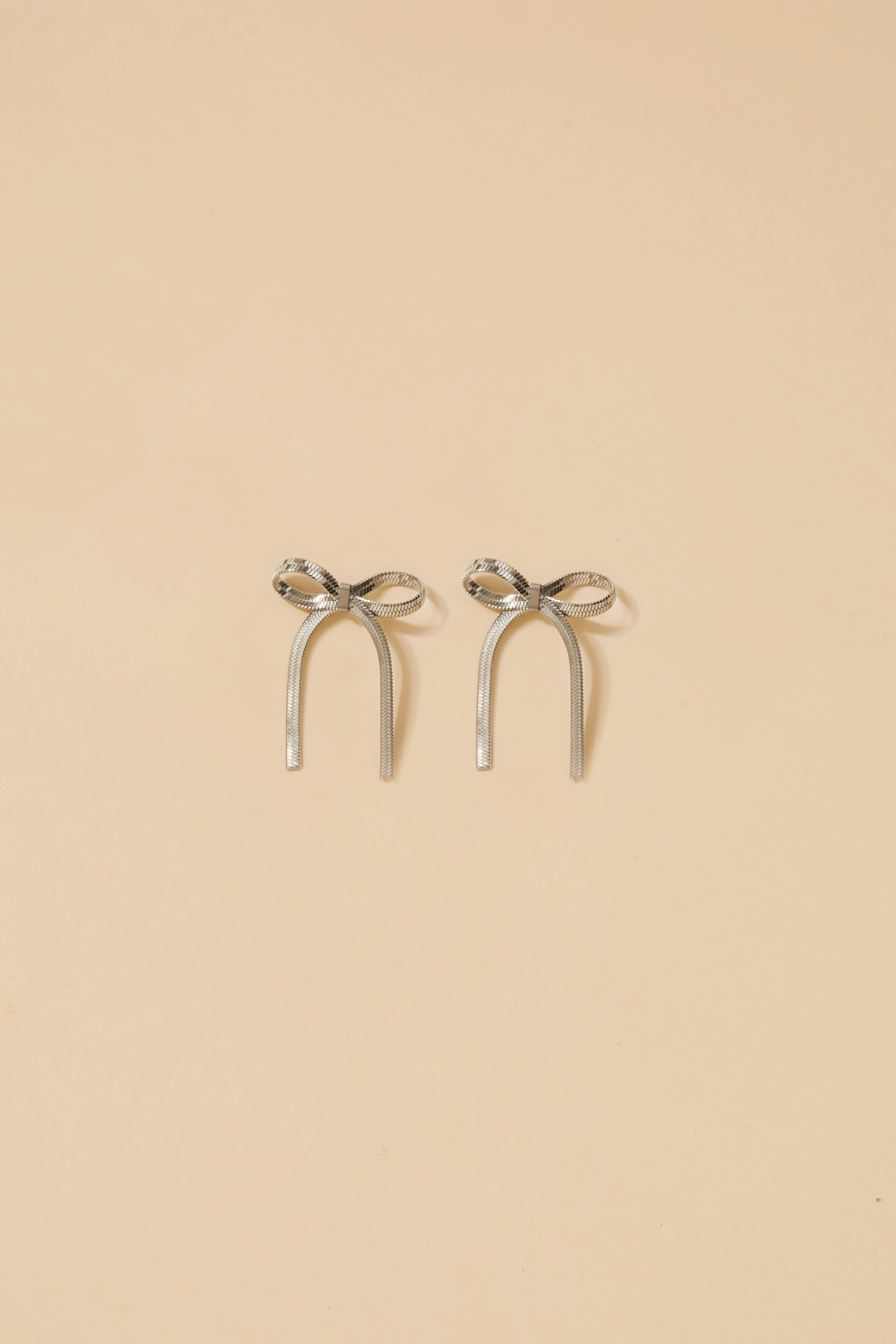 Bow Silver Earrings · Allure ·