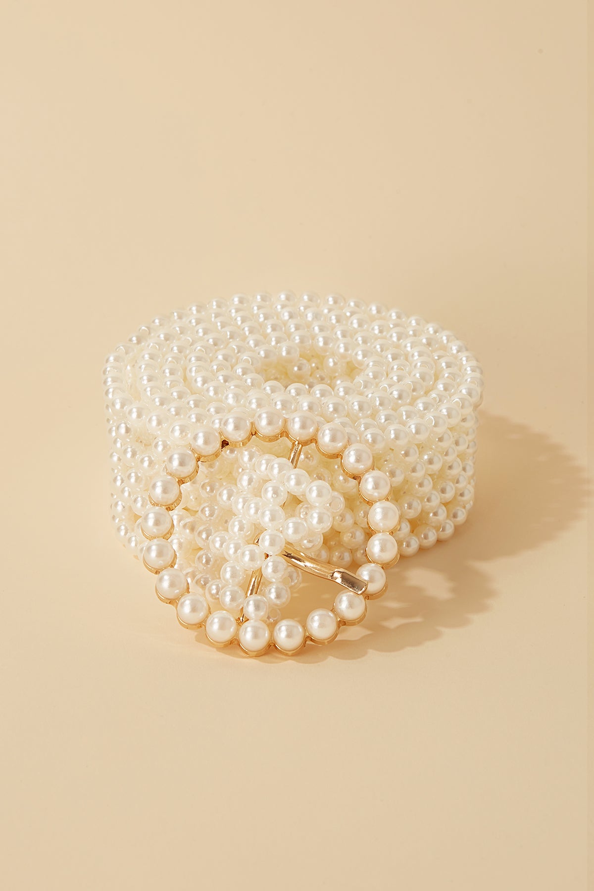 Cinturon Pearl Round · Flora · - Bruna