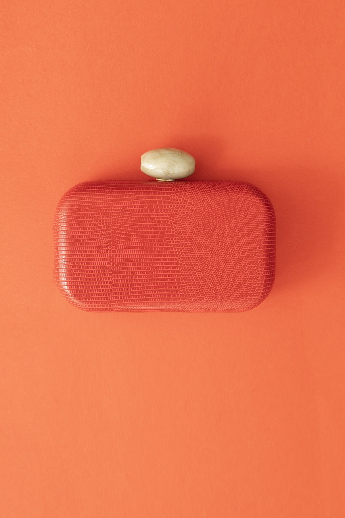 Clutch Hueso Snake Coral · Ipanema · - Bruna